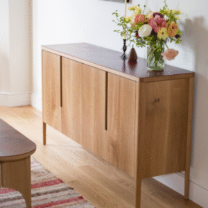 Modern minimalist wooden sideboard buffet with four seamless doors and integrated vertical recess handles by WoodBee Craft