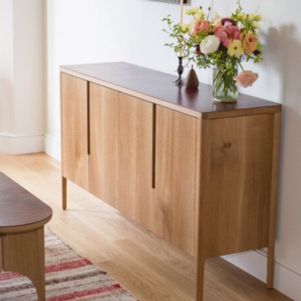 Modern minimalist wooden sideboard buffet with four seamless doors and integrated vertical recess handles by WoodBee Craft