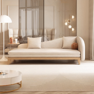 Modern minimalist chaise lounge sleeper sofa cum bed with cream upholstery and natural wood frame base by WoodBee Craft