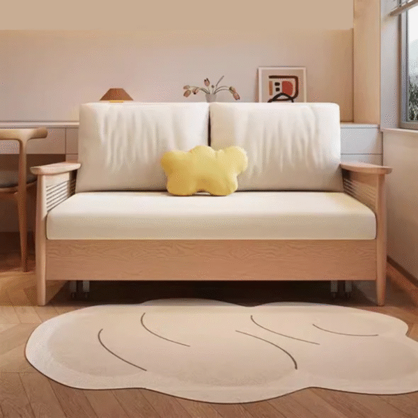 1 Japandi minimalist fold out wood sleeper sofa cum bed with light cream cushions and woven rattan cane side arms by WoodBee Craft