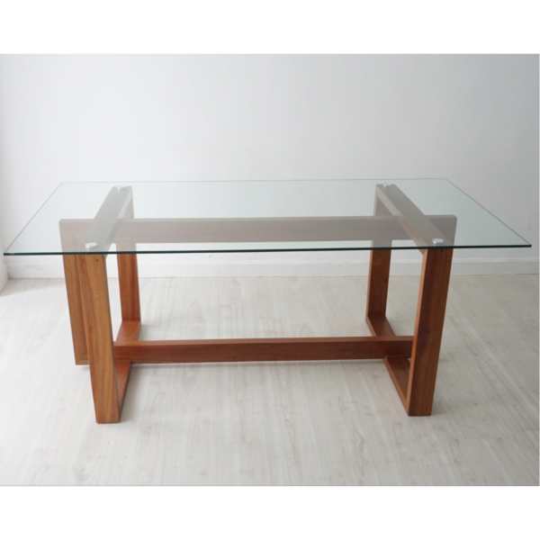 Modern minimalist tempered glass top wooden dining table with natural solid wood frame and architectural square trestle base by WoodBee Craft